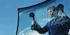 Changing a windshield at Low Price Auto Glass windshield repair